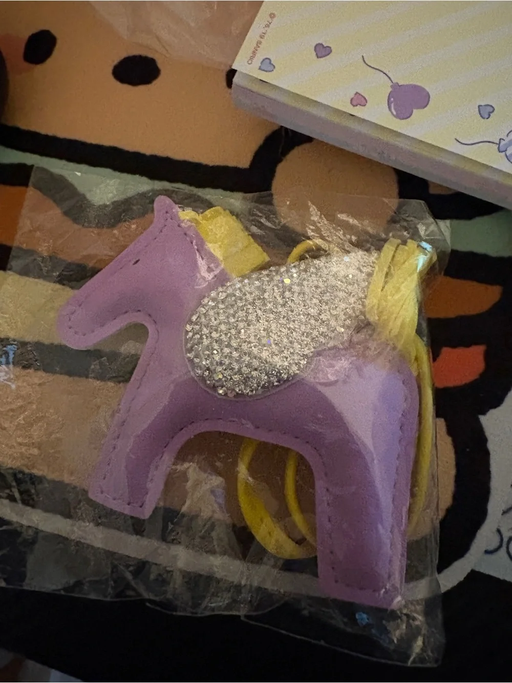 Purple Pony Bag Charm with Yellow Strap and Rhinestone Accent